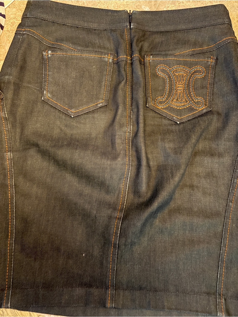 Vintage Celine denim  Skirt with Front Seams , Triumph on back.